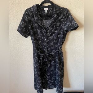 A new day button dress black with faces size medium. No tag but never worn.